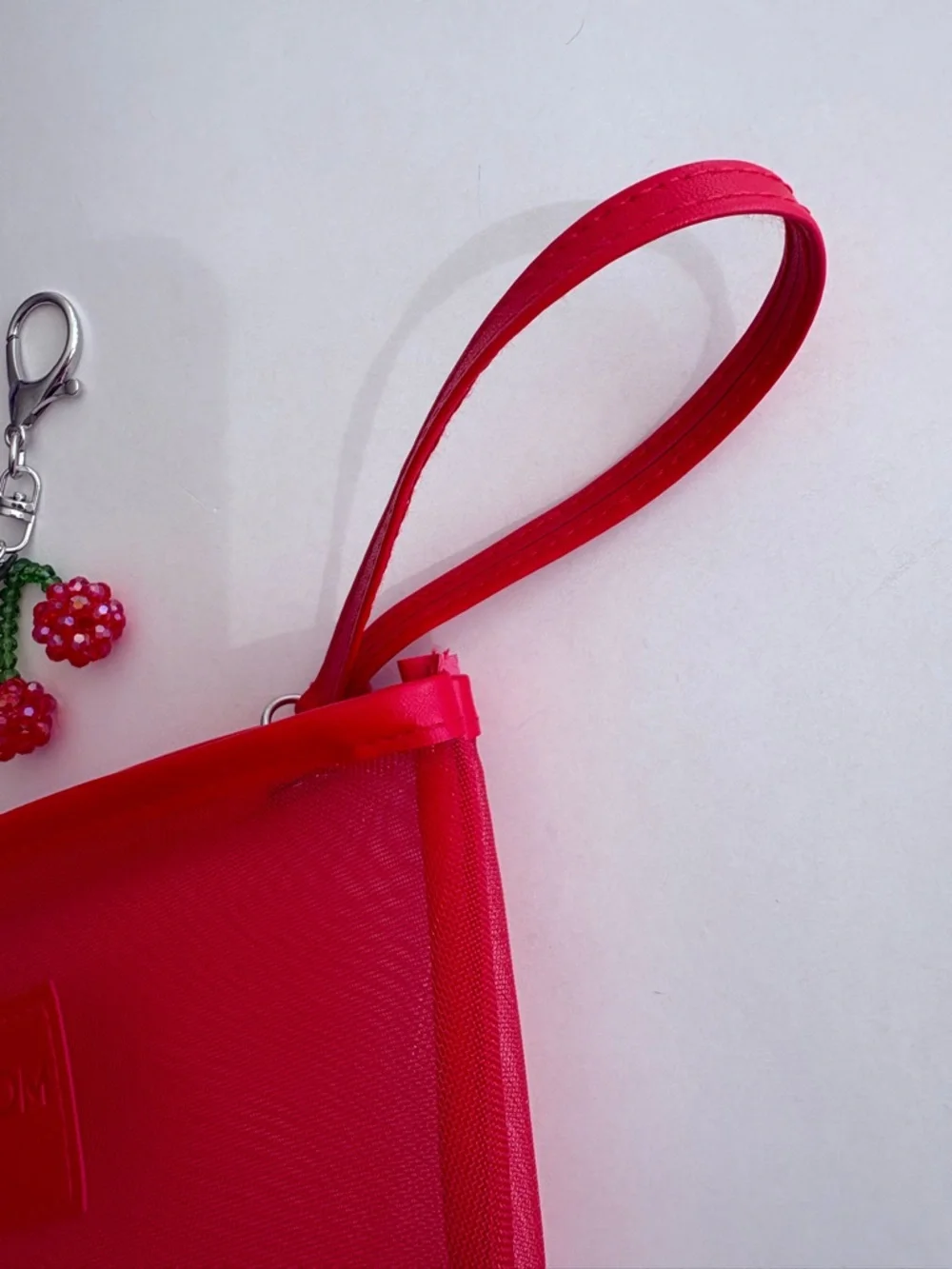 Nordstrom Beauty Bright Red Mesh Cosmetic Pouch with Wrist Strap and Cherry Char